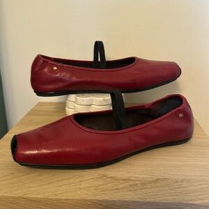 Tory Burch red leather “runway ballet” flats.